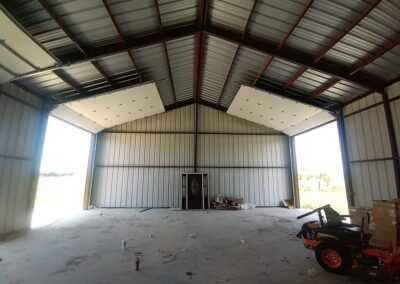 inside commercial steel building garage doors installed