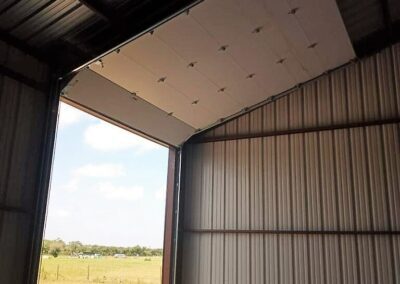 inside single commercial steel building garage doors installed